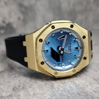 Casioak Mod Watch Gold Case Black Rubber Strap Silver Time Mark Ice Blue Dial 44mm- Casioak Mod Casio G-Shock Royal Oak Custom Mens Luxury Watches Ga2100