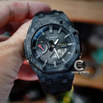 Montre Casioak Mod solaire en fibre de carbone Offshore, boîtier noir supérieur, bracelet en toile de nylon noir, index horaires noirs, cadrans noirs, 44mm